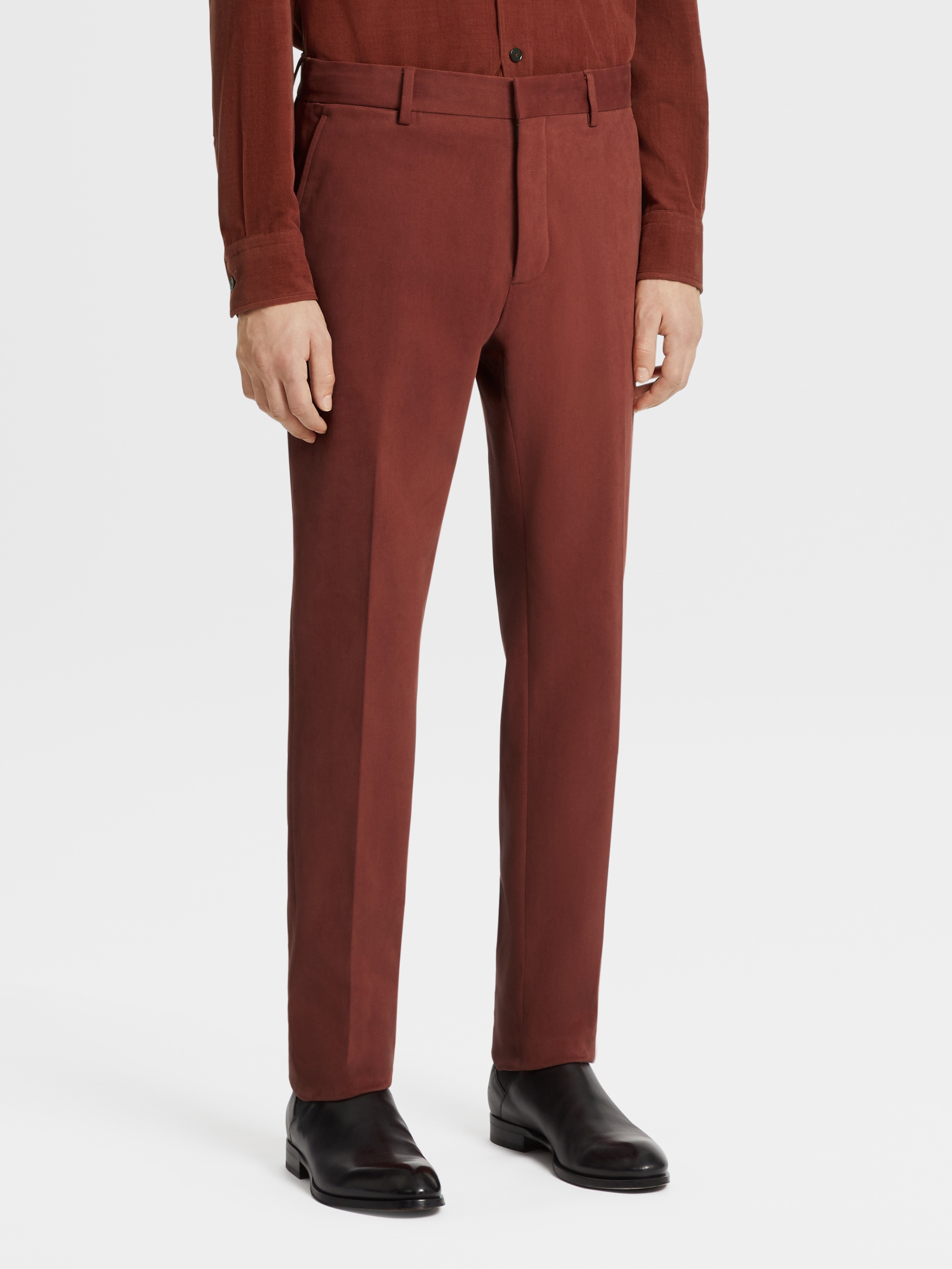 brick red trousers